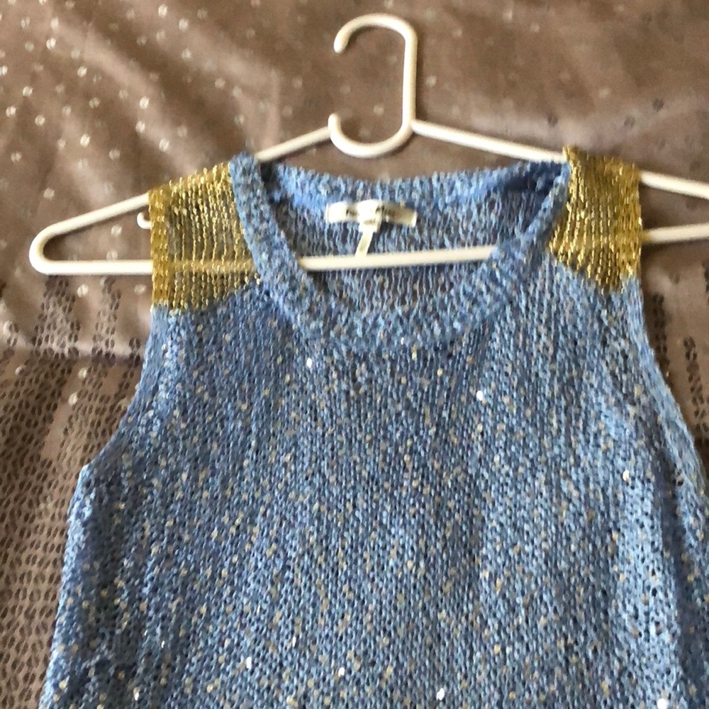 Blue/Gold shirt.